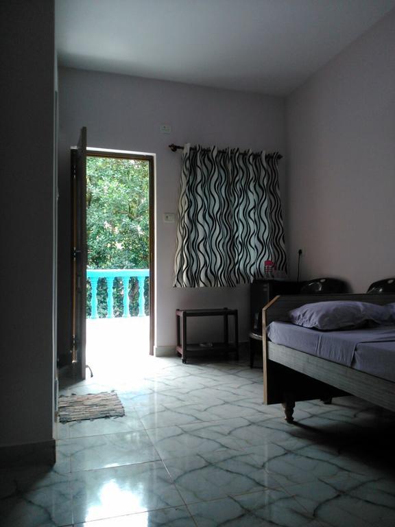 Casa Almeida Guest House Кандолим Стая снимка